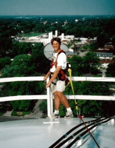 Founder Nathan Stooke on a tower circa 2003