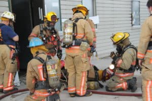 Members of the Washington Fire Department prepare for a call